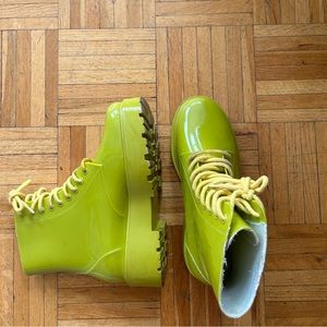 Neon green combat boots from ASOS. Yellow laces.